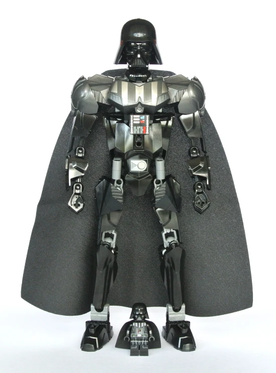 a toy figurine wearing a cape and helmet