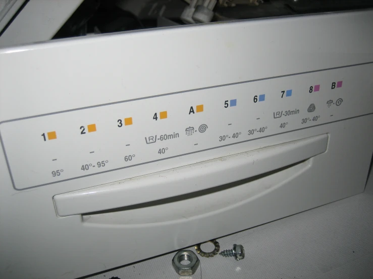 a washing machine is shown with the ons on it