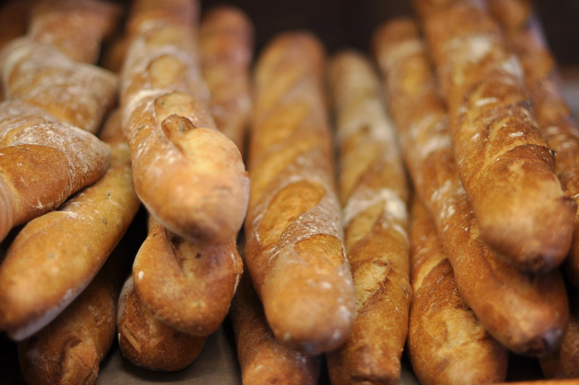 some breads with no filling on them that are sitting together