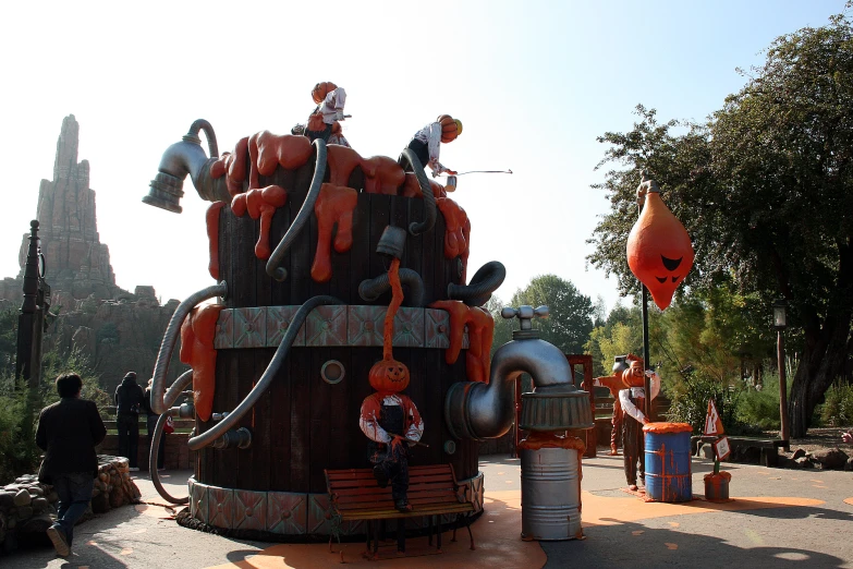 a sculpture in the shape of an elephant at a park