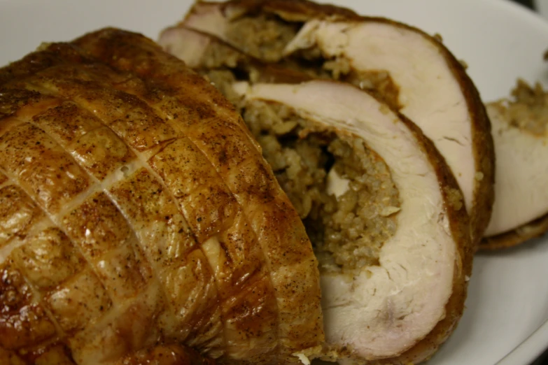 a meaty plate containing pork and rice