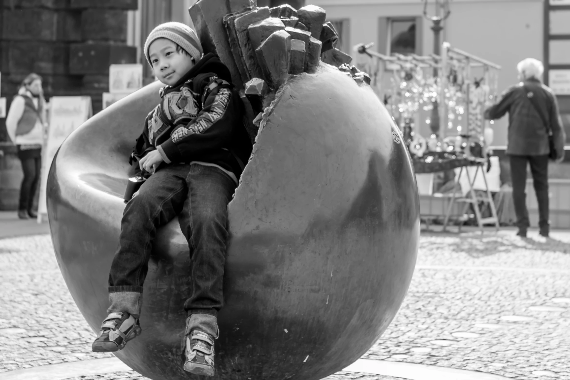 a small child in a large metal chair