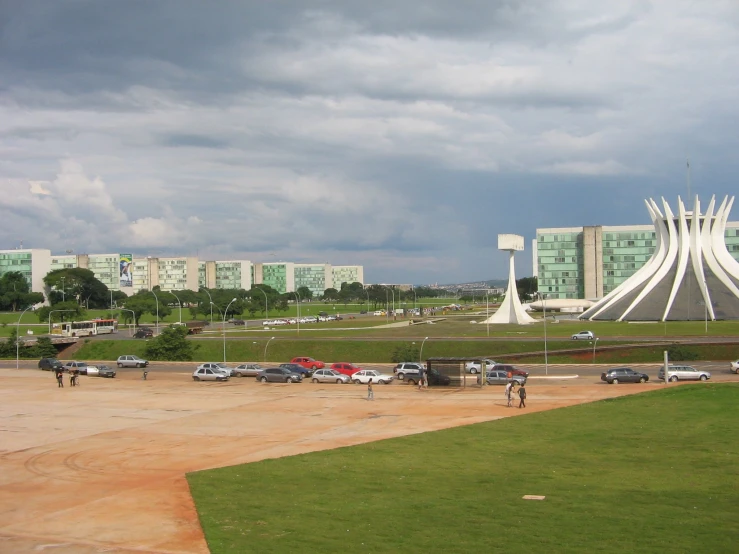 a wide view of a city with buildings in the background