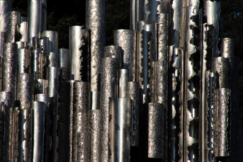 a metal sculpture is shown with an odd pattern