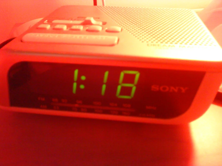 the alarm clock is setting to 7 14