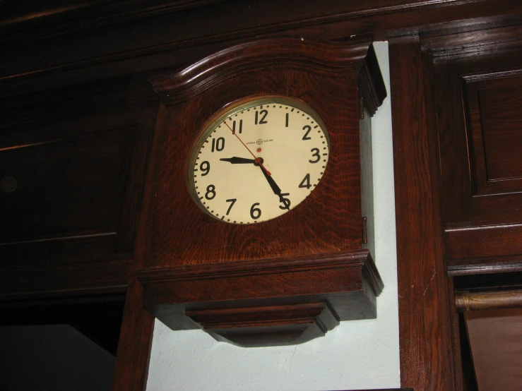 a clock on the wall in a bedroom