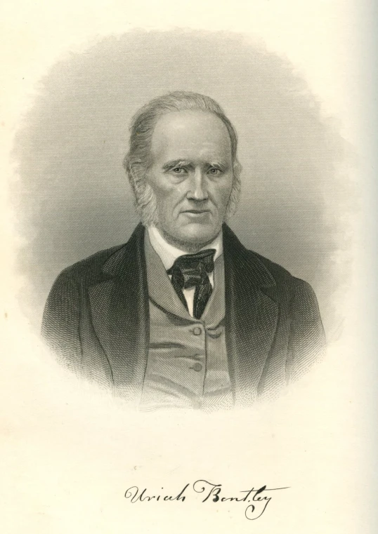 a portrait of a man wearing a coat and tie