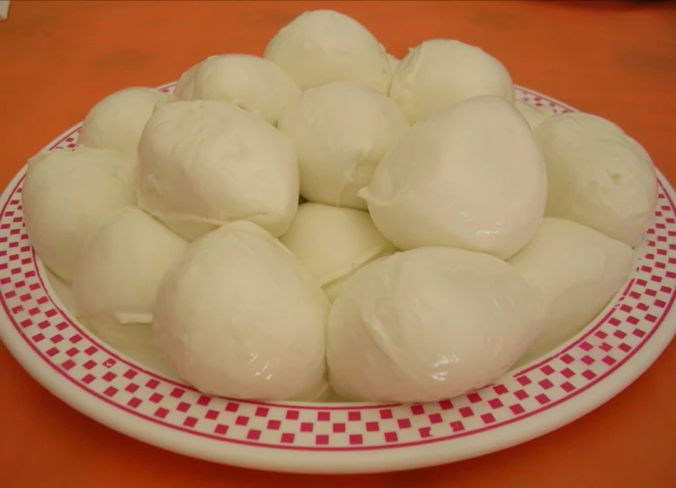 a plate of dumplings on a table