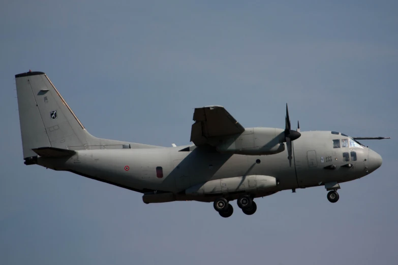 an airplane in the air with one front wing out