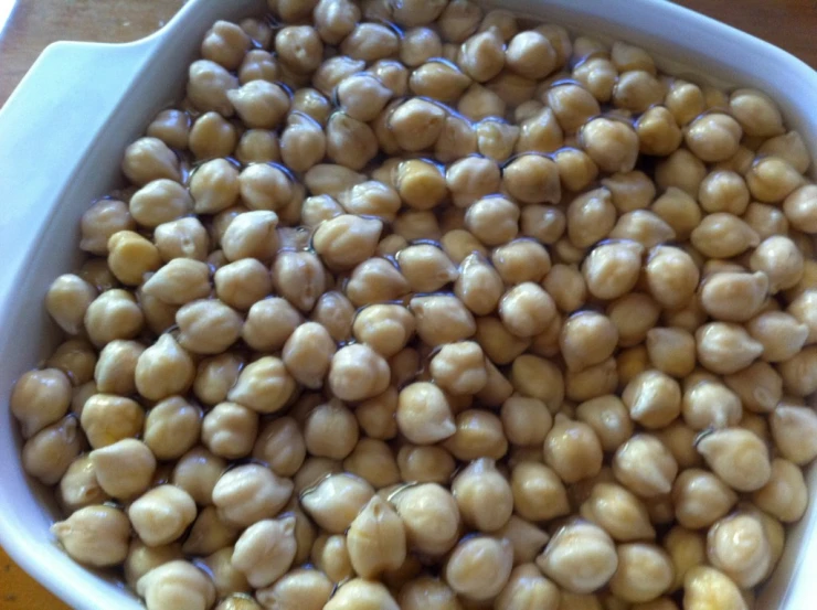 roasted chick peas are cooked in a large bowl
