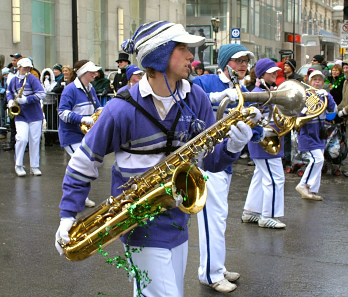 a group of men and women with hats, playing musical instruments