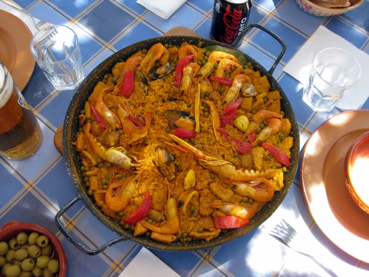 a large dish of prepared food on top of a table