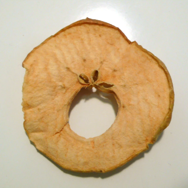 a close up of an apple peel with a smaller section in the middle