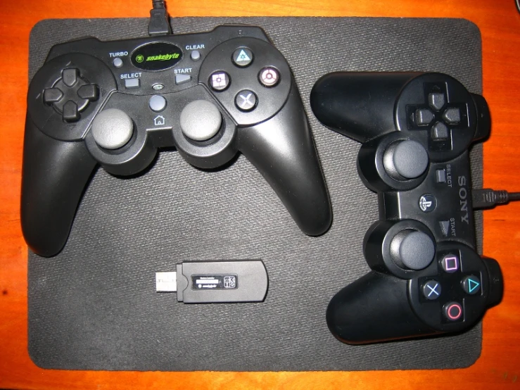 there are two controllers and a charging device