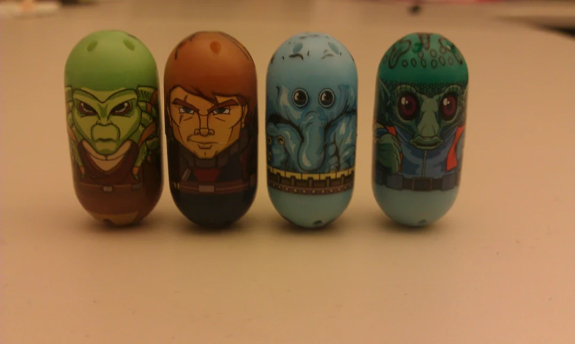five painted eggs arranged in an elaborate manner