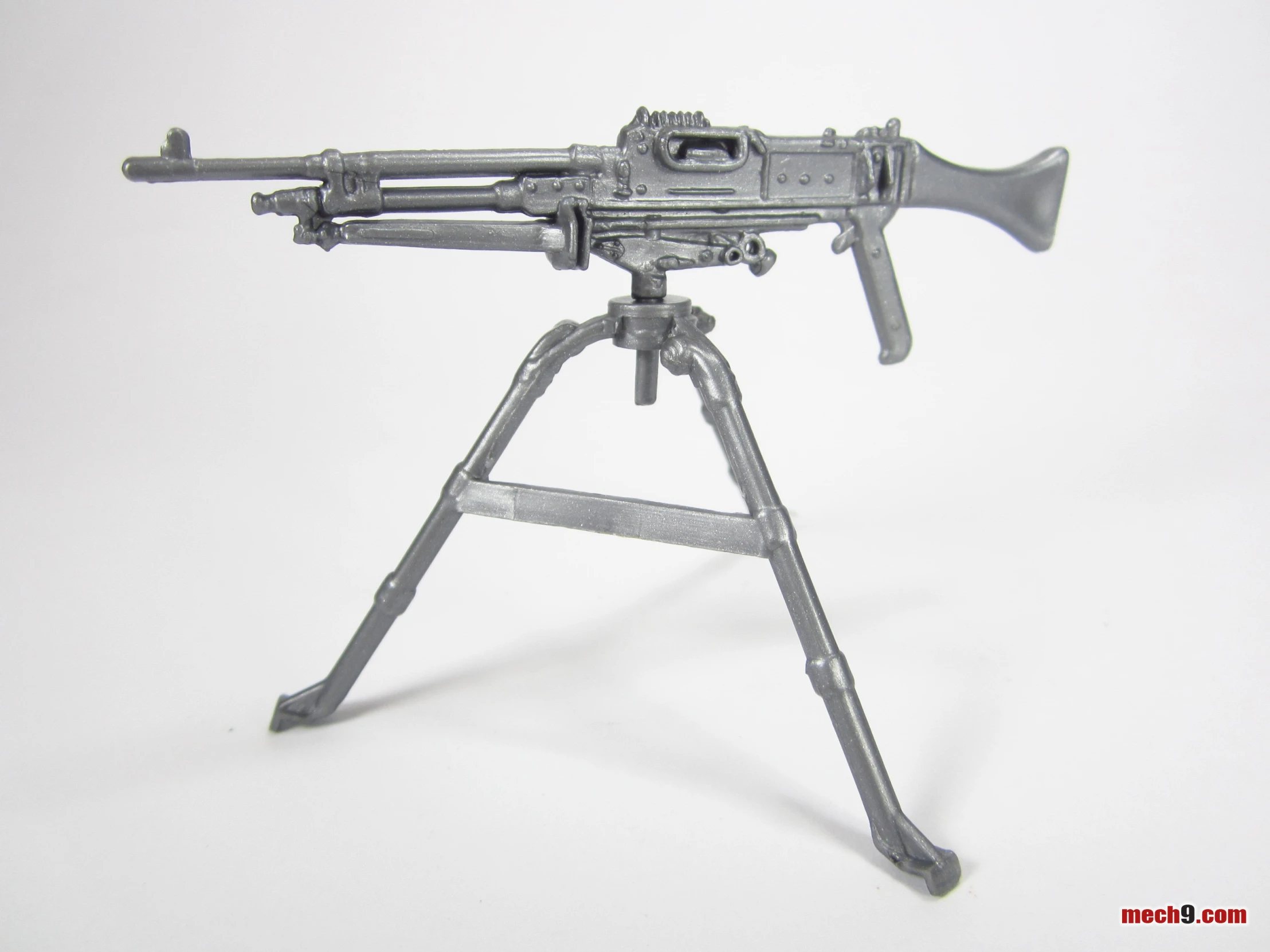 a metal model of an ak 47 in the shape of a gun