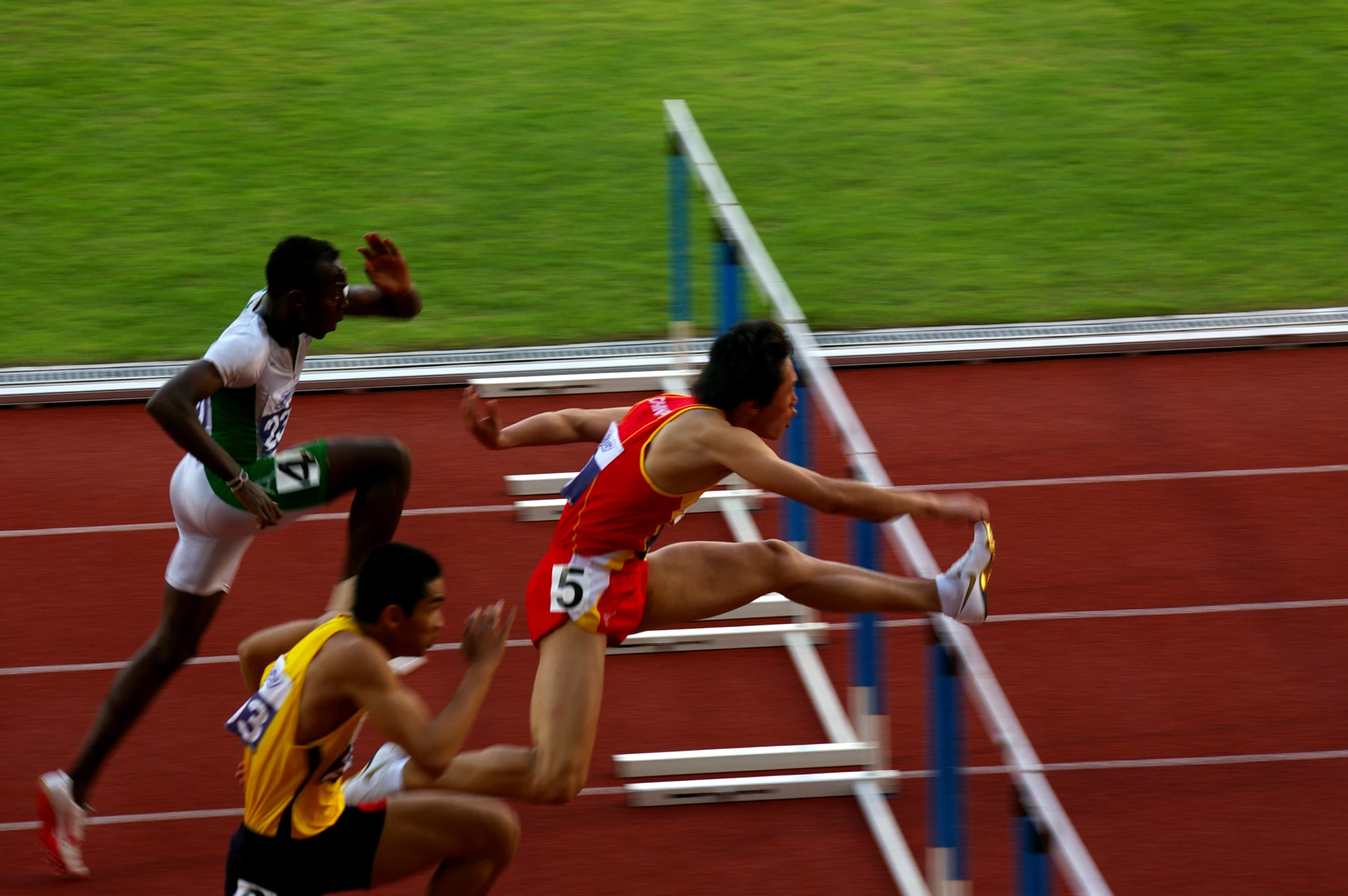 the athletes are racing around on the track