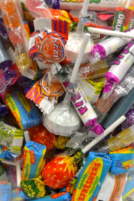 the colorful variety of candy is in plastic