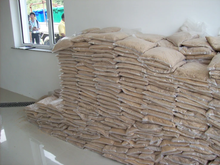 a pile of sand bags on top of white counter