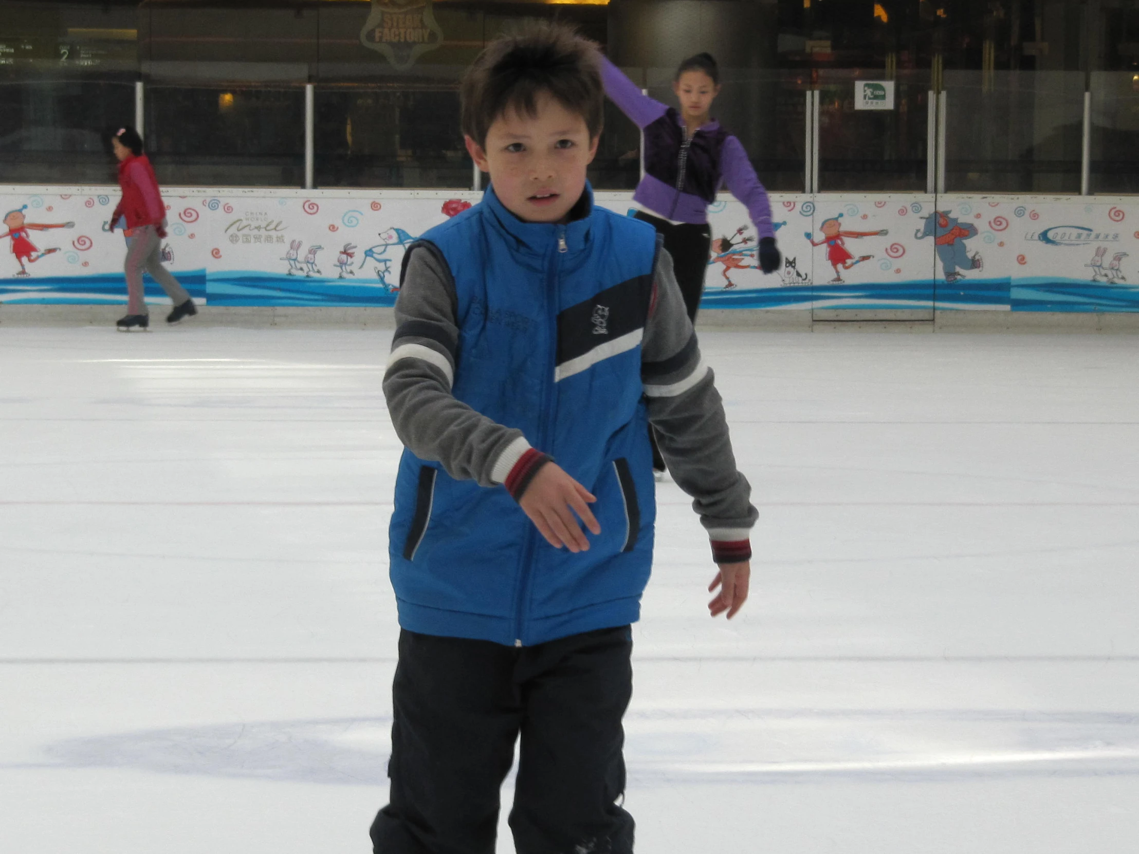 there is a  riding on the ice rink