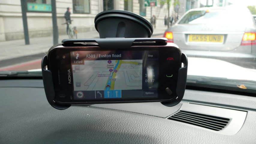 a dashboard camera mounted on the dash of a car