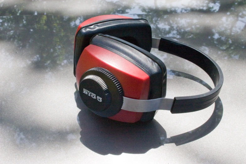 the red and black ear defenders have black rubber cords
