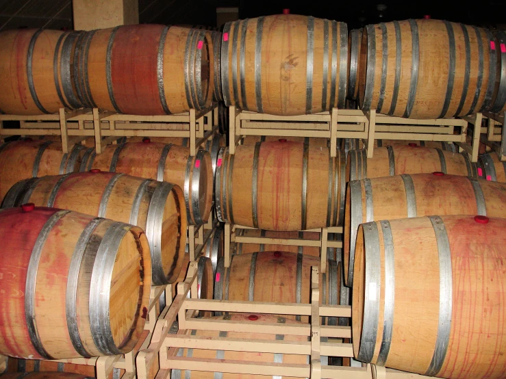 a group of wooden barrels stacked on each other