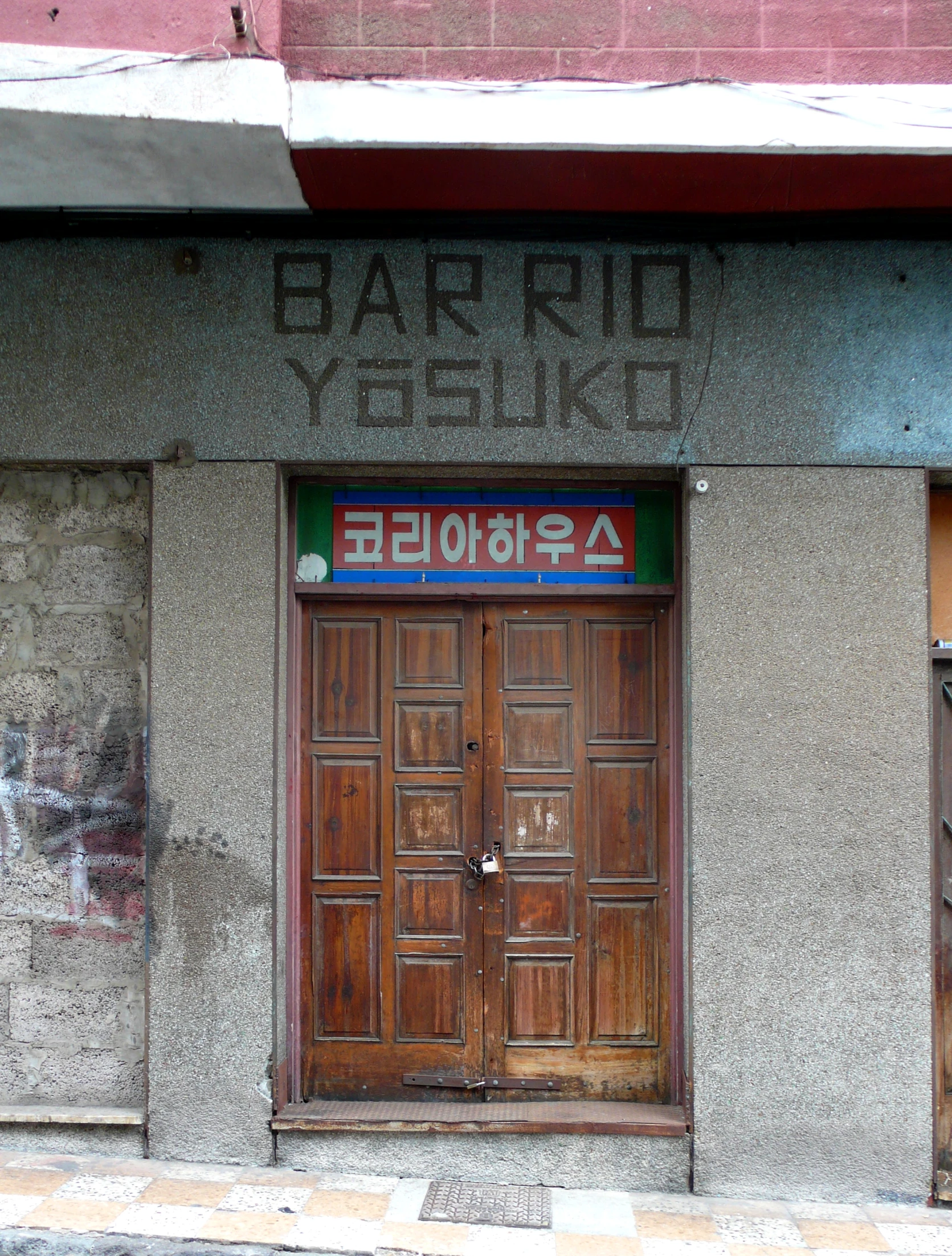 a door of a building that has writing on it