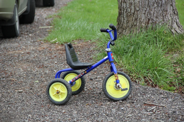 the little  bike has two different wheels