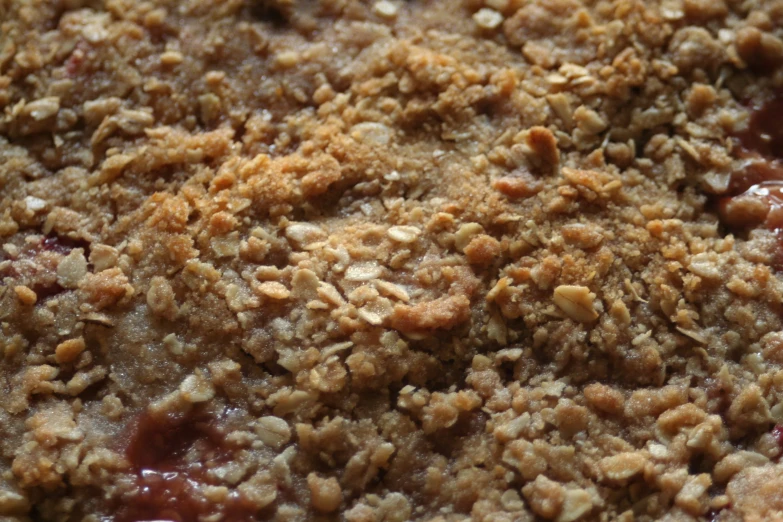 a close up view of some food with red sauce on it