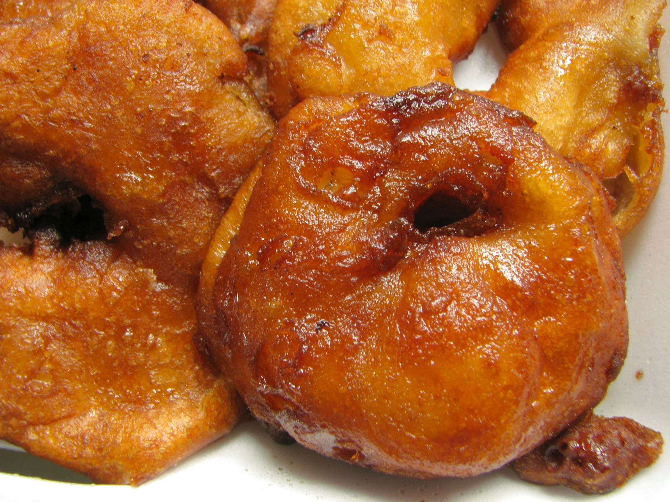 close up of a box filled with doughnuts