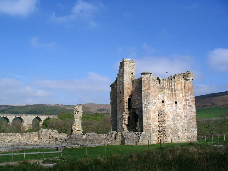 an old stone castle built with the remains of another building