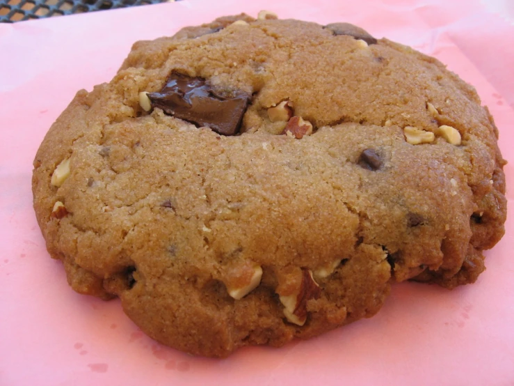 a cookie with nutella and a piece of chocolate