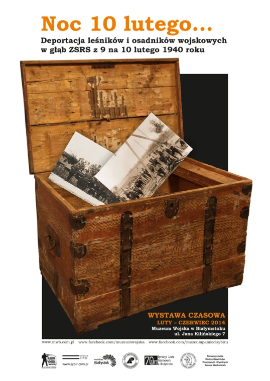 a wooden trunk with an open top sits in the middle of a black background