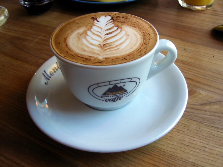 an espresso coffee latte with artful taste