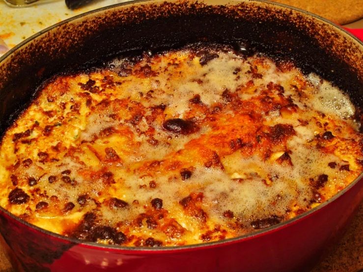 a close up of a pie in a pan on a table