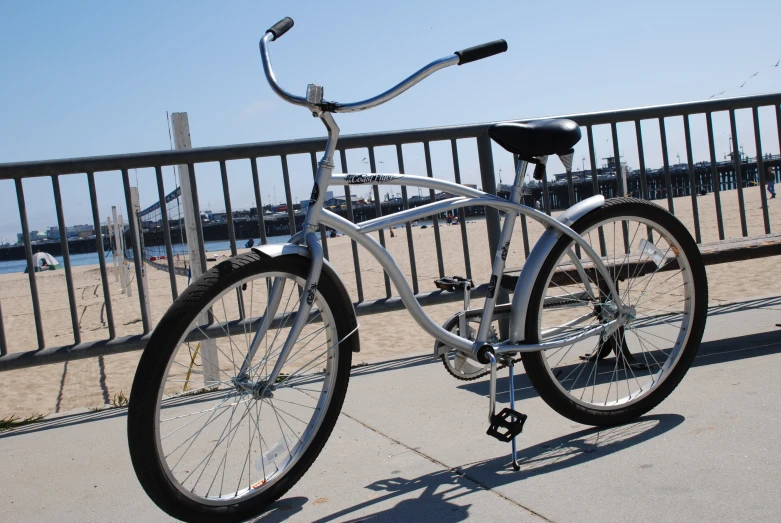 there is a bicycle that is leaning on a metal pole