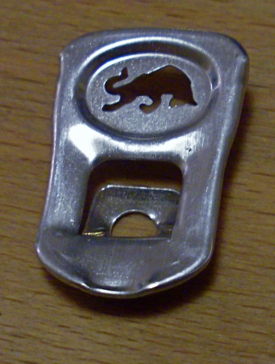 there is a bottle opener with an elephant on it