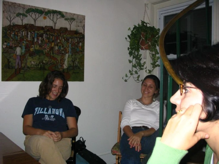 people sitting in the corner of a room