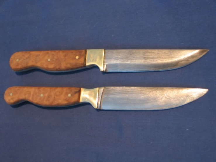 two knives, one very long and one short