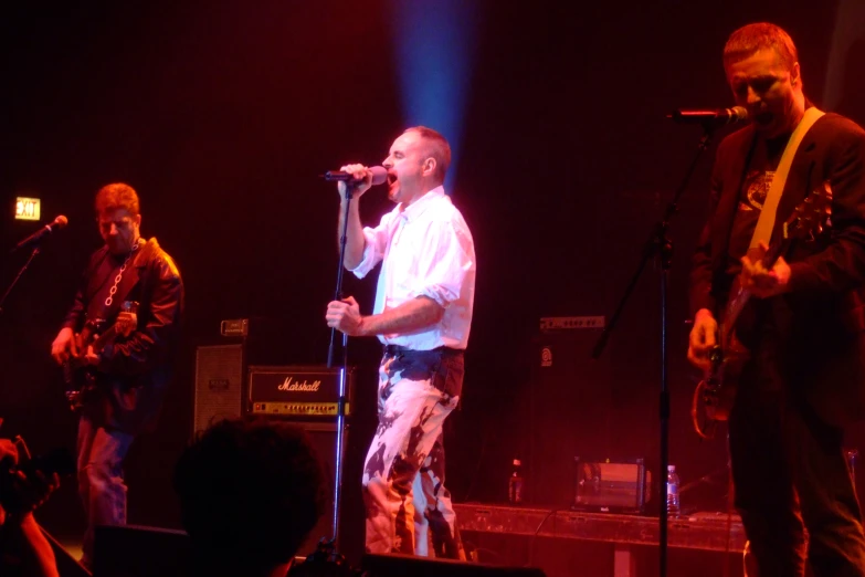 an image of a band playing in concert