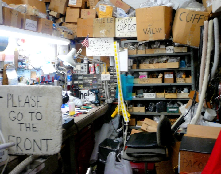 an organized, cluttered sewing room with a lot of tools