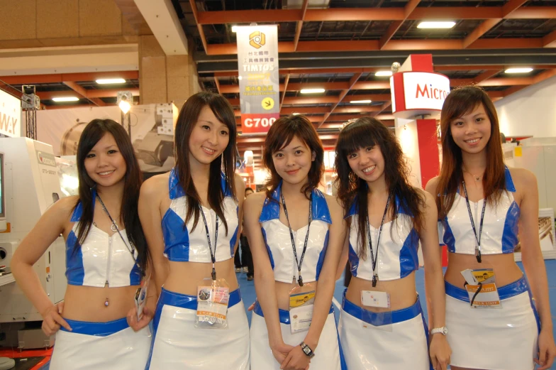 a group of women in uniforms standing next to each other