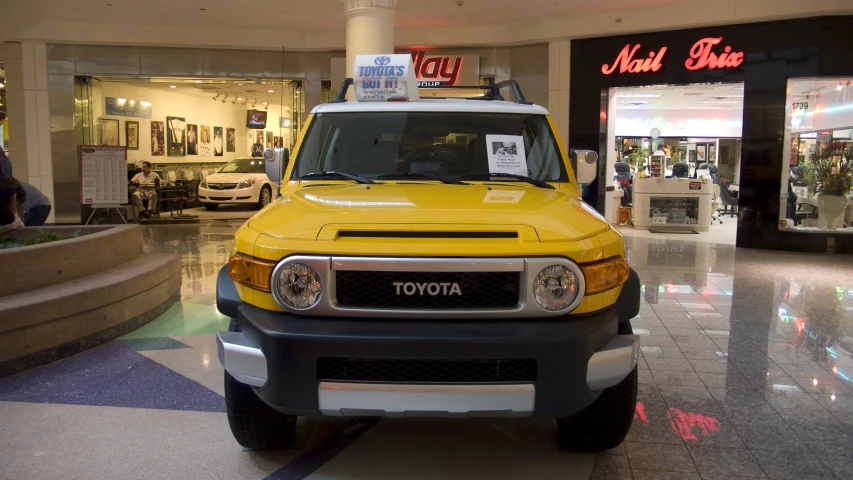 a toyota f - series pickup truck sits in front of a target store