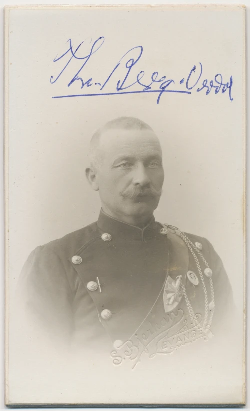 an old fashioned picture of a man wearing military attire