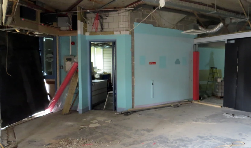 the doorway to a room in a house being renovated