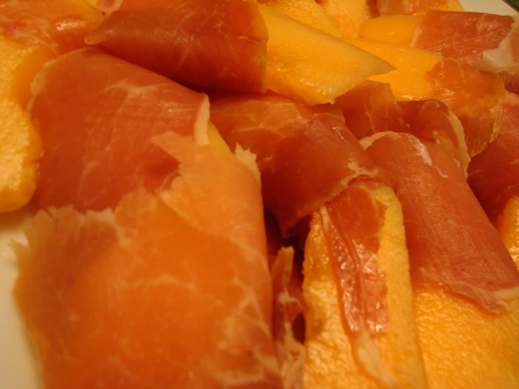 pieces of fruits are shown on a plate