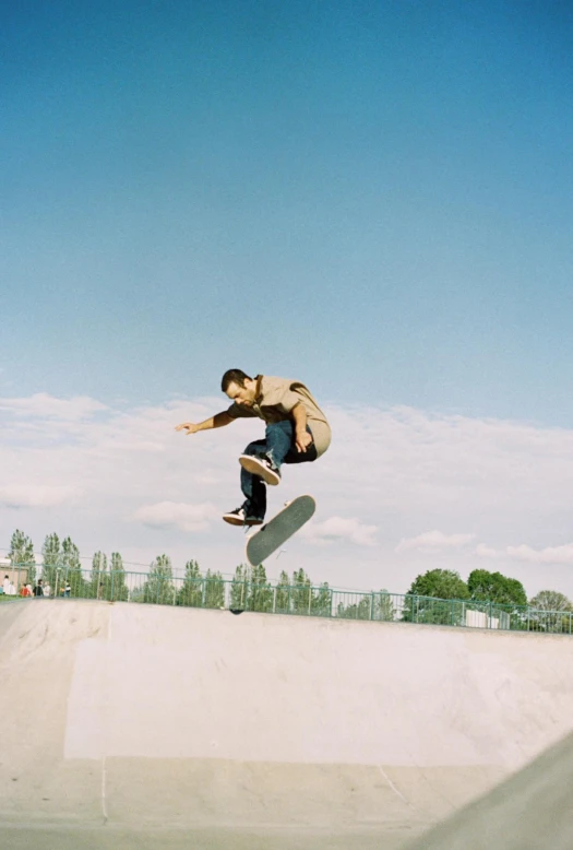 a man jumping a skate board in the air