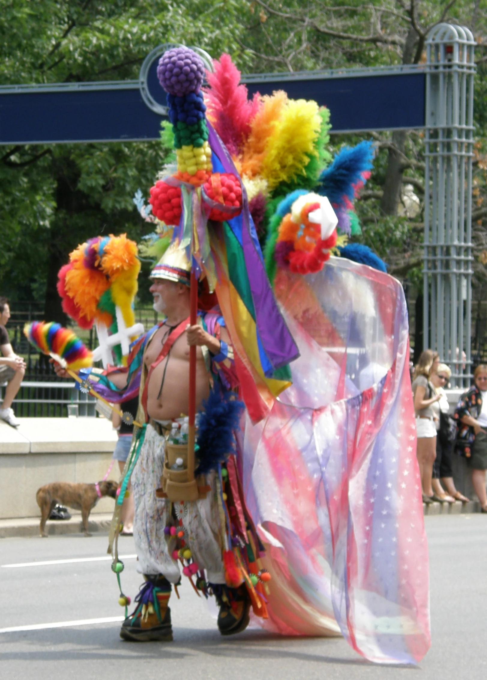 the street parade is taking place on top of a hill