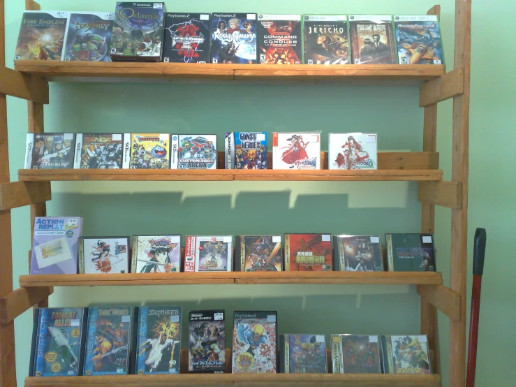 the display of comics on a wooden shelf